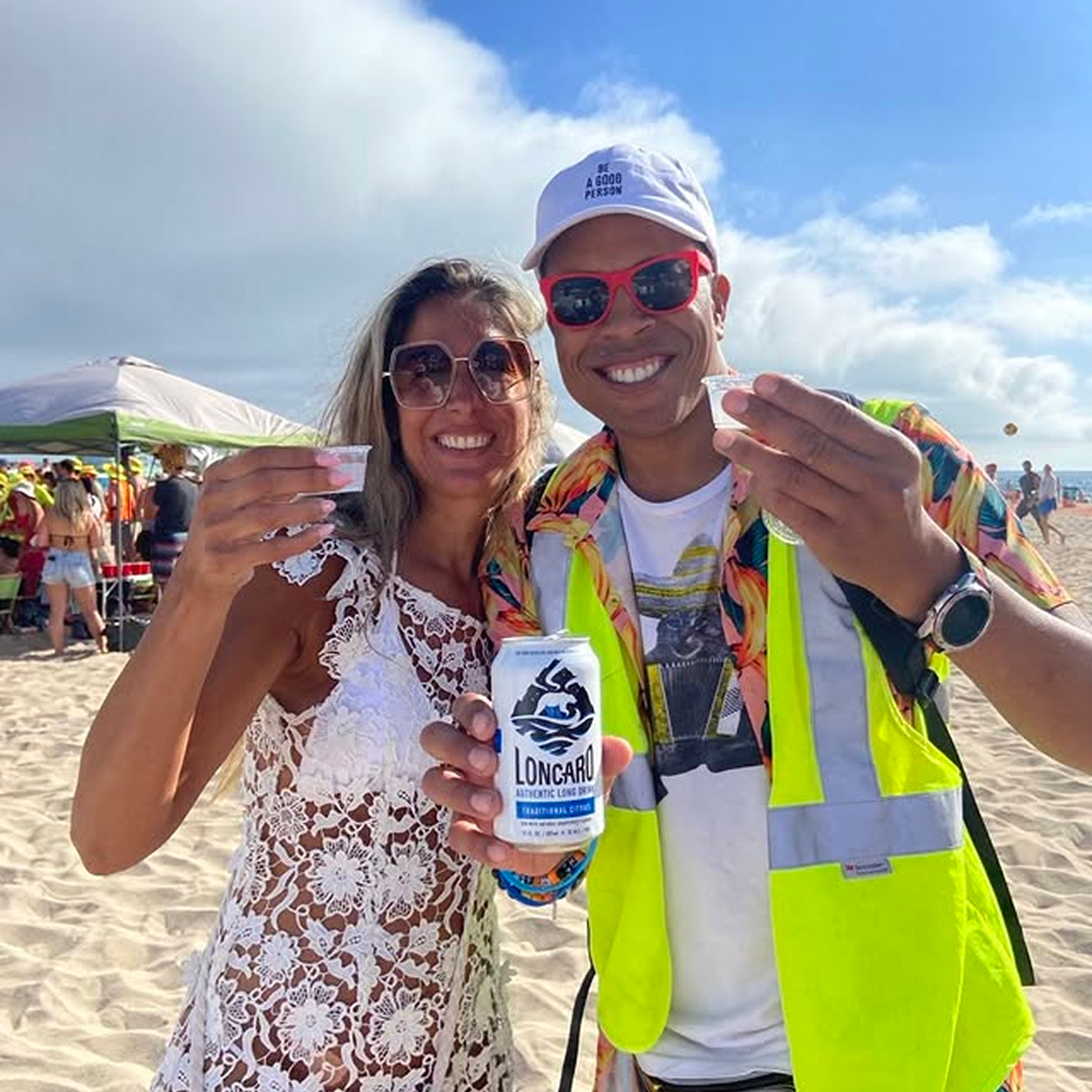 Smiling man woman holding can