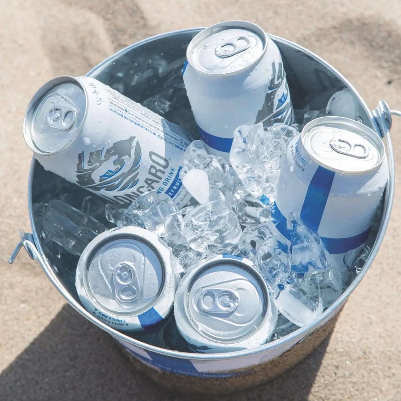 Cans of Loncaro in an ice bucket